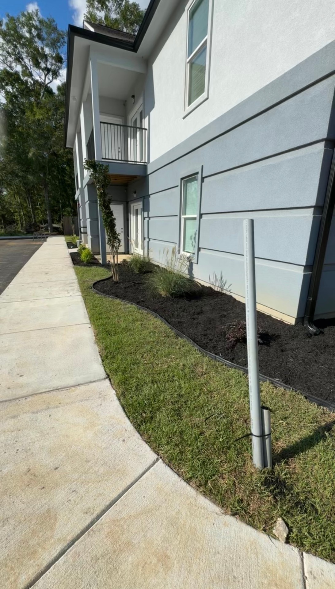 Fresh mulch installation with clean bed edges